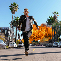 Man running from explosion